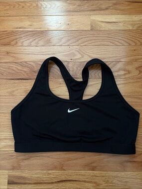 Women’s Nike Large black sports bra ( not padded)